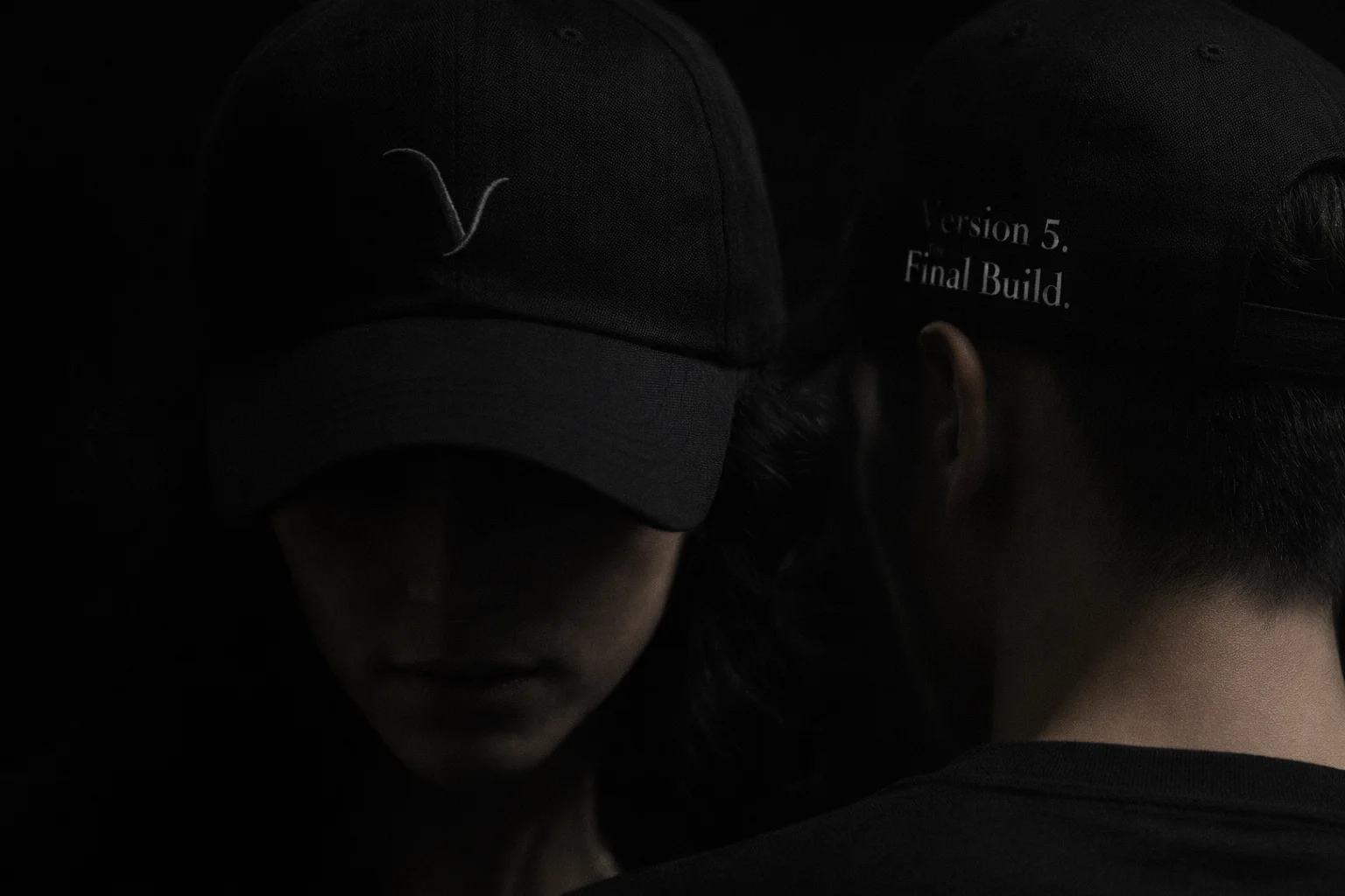 Black baseball cap with Version 5 Final Build side embroidery