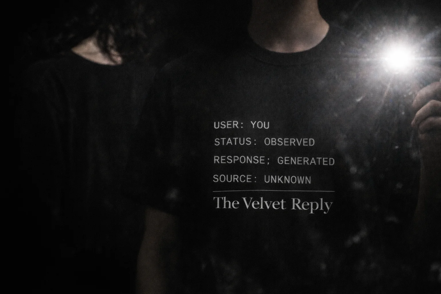 Black T-shirt with USER STATUS RESPONSE SOURCE terminal text block